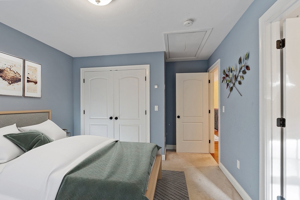 9 Winter Hill Road Lunenburg, MA 01462 - Photo 34 of 42 a bedroom with a bed and a painting on the wall