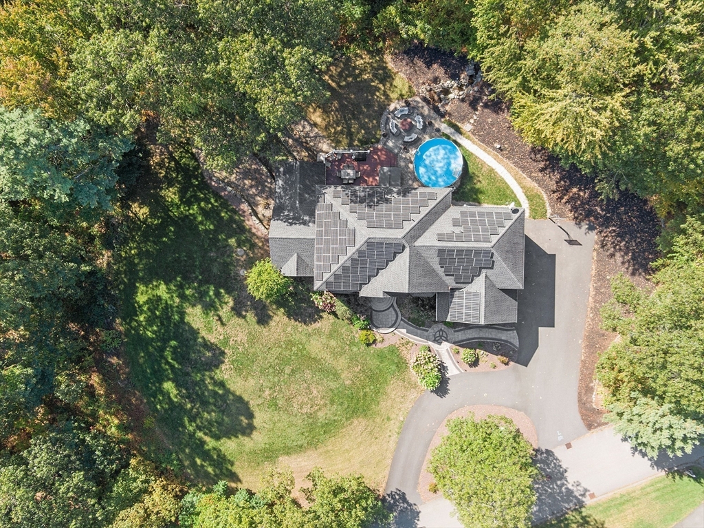 9 Winter Hill Road Lunenburg, MA 01462 - Photo 5 of 42 a aerial view of a house with a yard and large trees