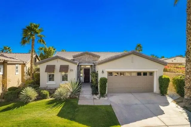 a view of a house with a big yard
