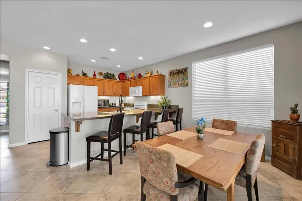 a view of a swimming pool and a yard