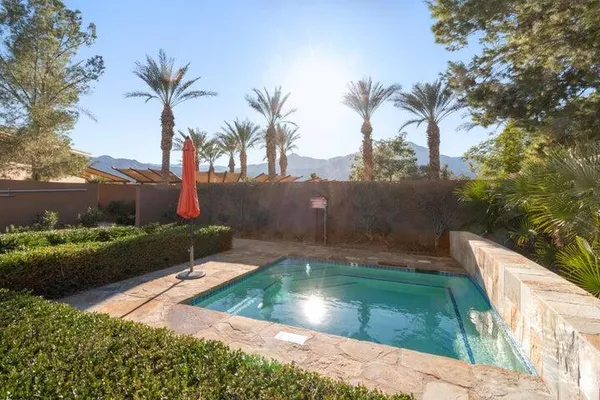 an aerial view of a house with swimming pool