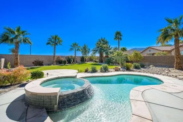 a lobby with furniture and window