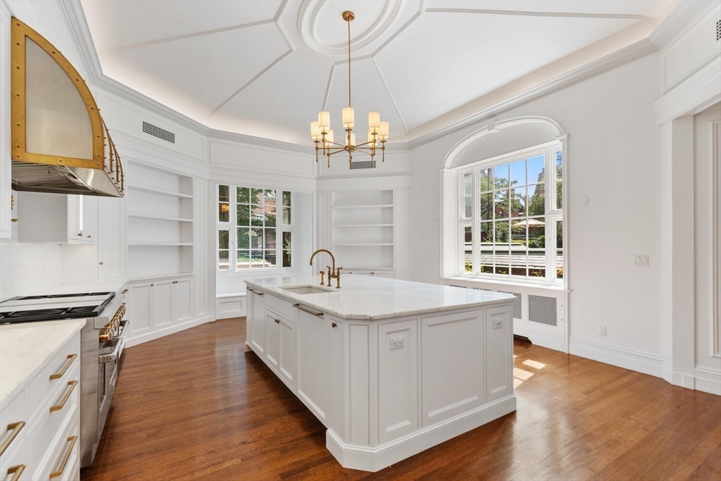 20 Chestnut Street, Unit 1 Boston, MA 02108 - Photo 4 of 26 a view of a kitchen sink and wooden floor