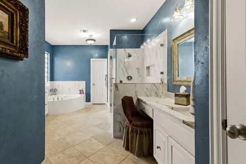a kitchen with stainless steel appliances a refrigerator sink and cabinets