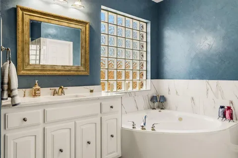 a bathroom with a sink and a bathtub