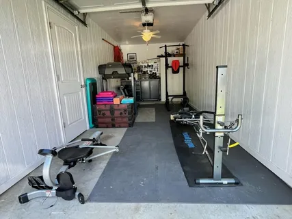 a gym room with gym equipment
