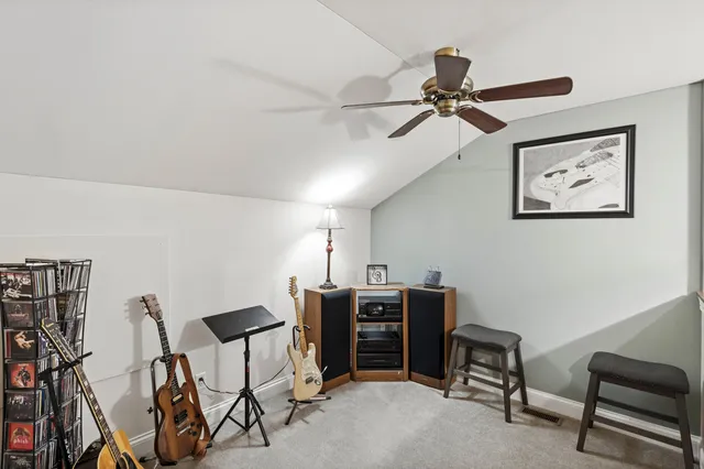 a view of a workspace with furniture