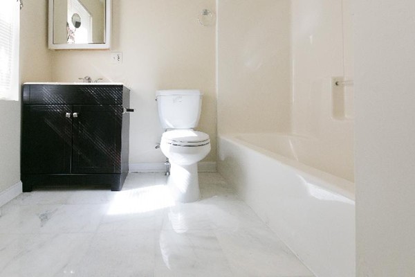 5 Everett Court Boston, MA 02128 - Photo 9 of 9 a bathroom with a toilet and a shower