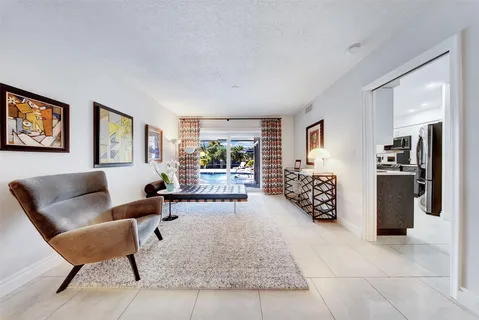 a view of a house with a yard and tree s