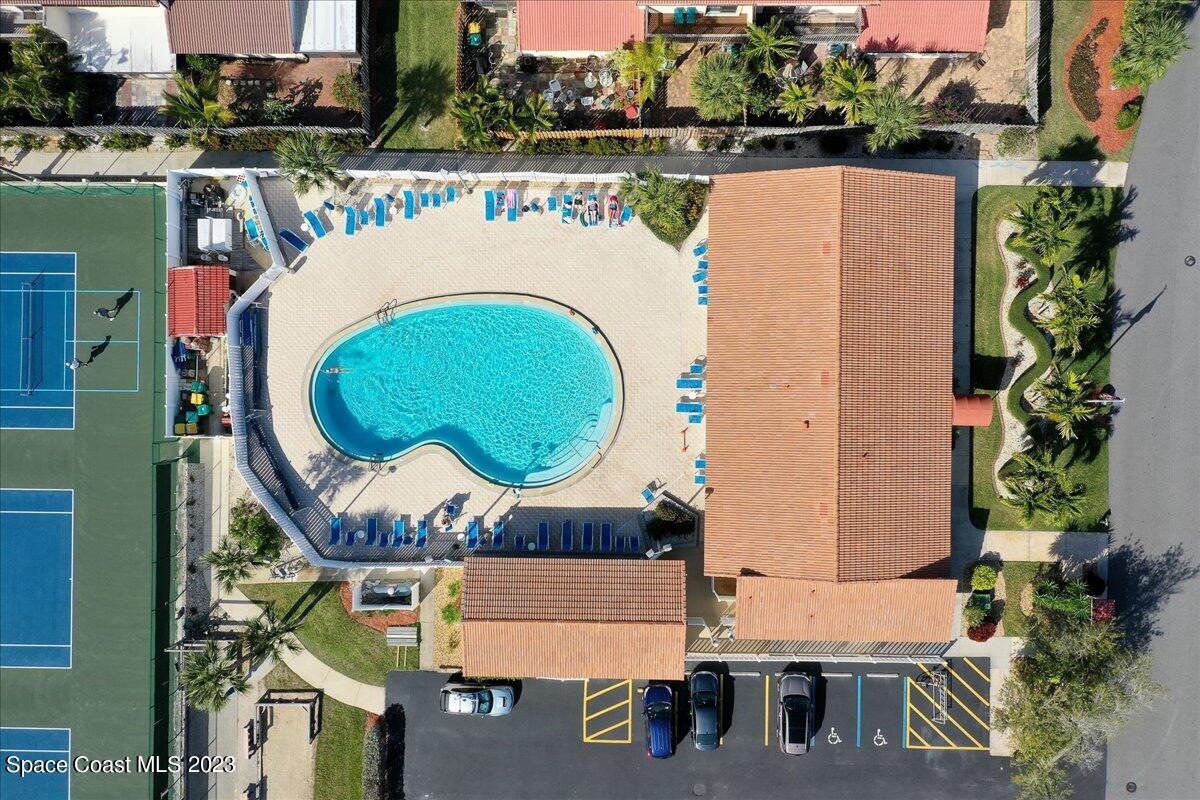 3193 Ricks Way Melbourne Beach, FL 32951 - Photo 15 of 22 an aerial view of a house with a swimming pool and outdoor space