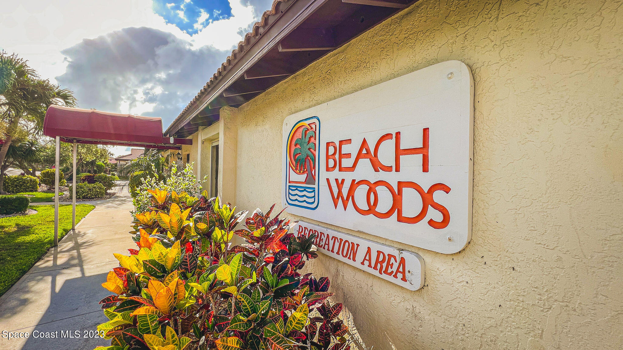 3193 Ricks Way Melbourne Beach, FL 32951 - Photo 21 of 22 a street sign on the wall next to a building