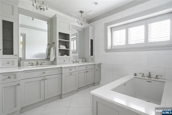 a bathroom with a sink and a bathtub
