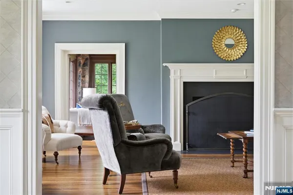 a view of a livingroom with furniture and a fireplace