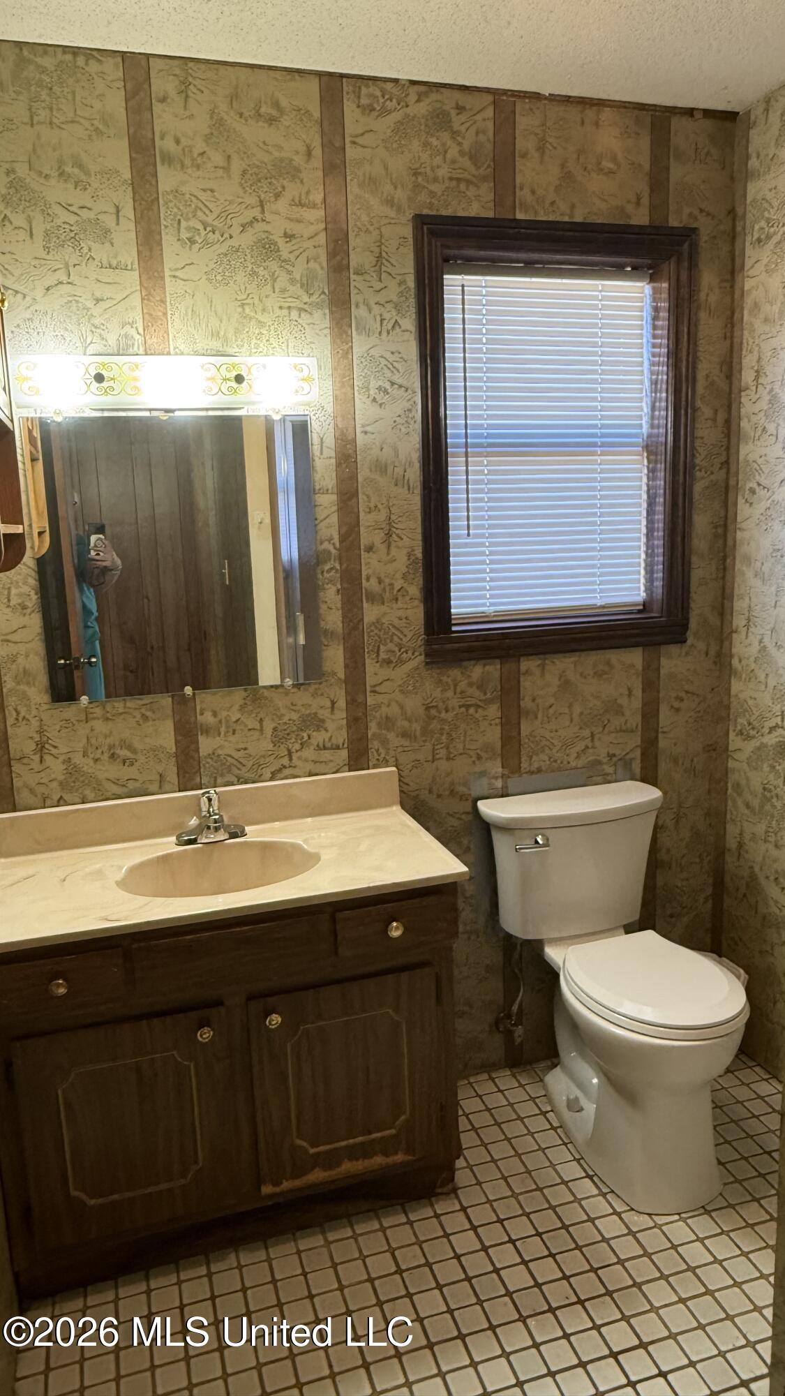 9004 Tucker Road Ocean Springs, MS 39565 - Photo 13 of 15 Guest Bathroom