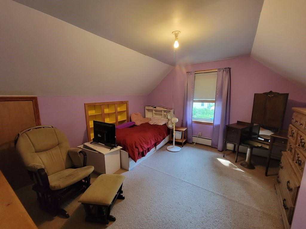 208 Old Belchertown Road Ware, MA 01082 - Photo 15 of 23 a bedroom with furniture and a flat screen tv
