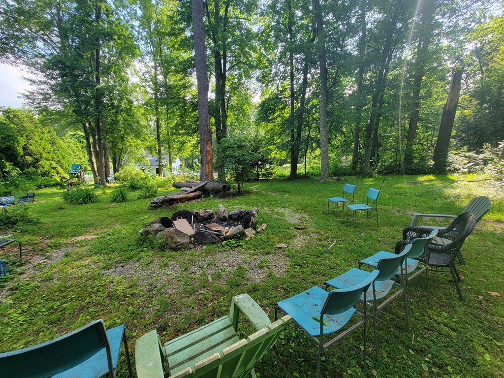208 Old Belchertown Road Ware, MA 01082 - Photo 20 of 23 a view of a table and chairs in backyard