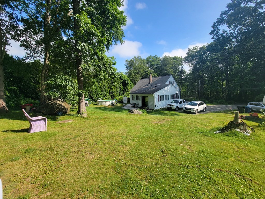 208 Old Belchertown Road Ware, MA 01082 - Photo 2 of 23 a view of a house with swimming pool and sitting area