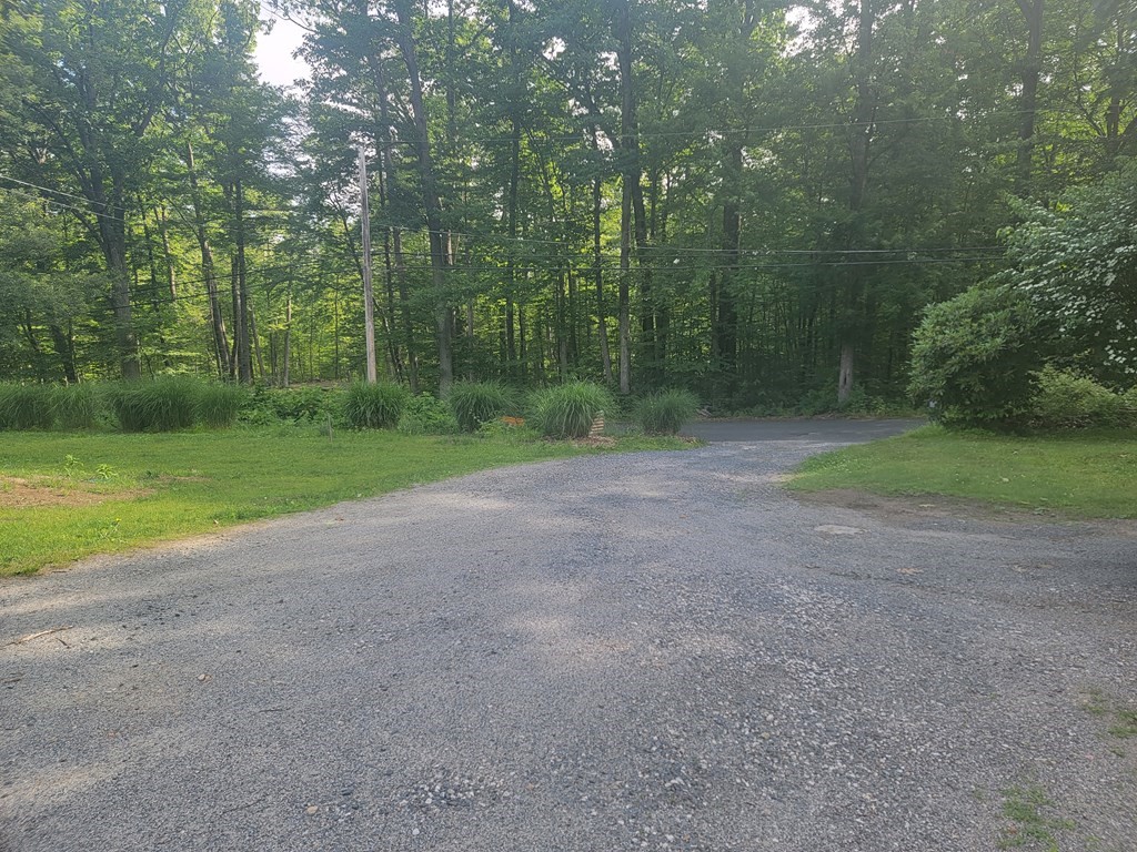 208 Old Belchertown Road Ware, MA 01082 - Photo 23 of 23 a view of a field with trees in background