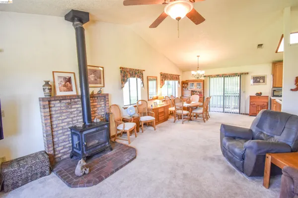 a living room with furniture a chandelier