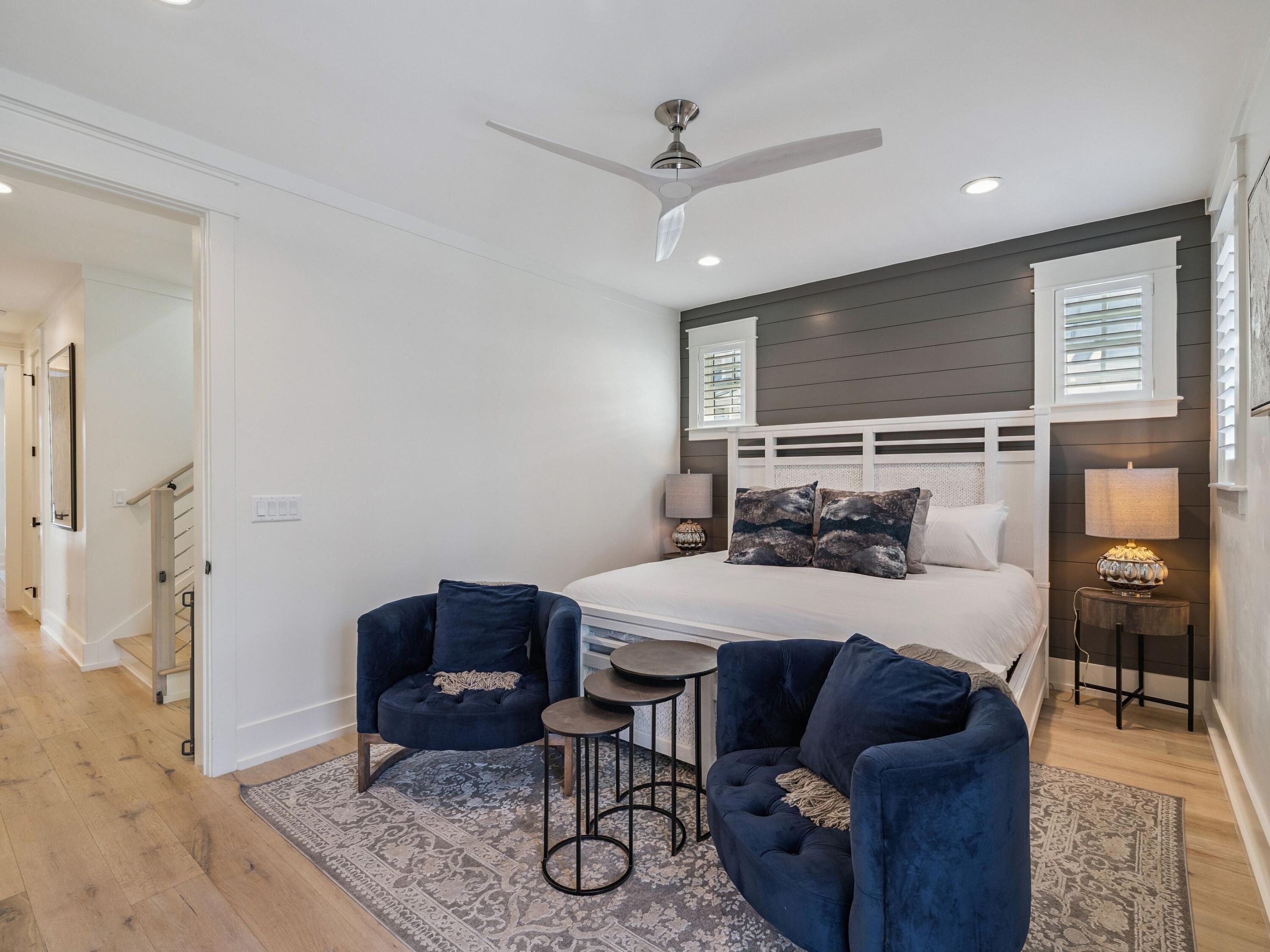 205 Seacrest Beach Boulevard Seacrest, FL 32461 - Photo 20 of 39 a bedroom with a bed and a table