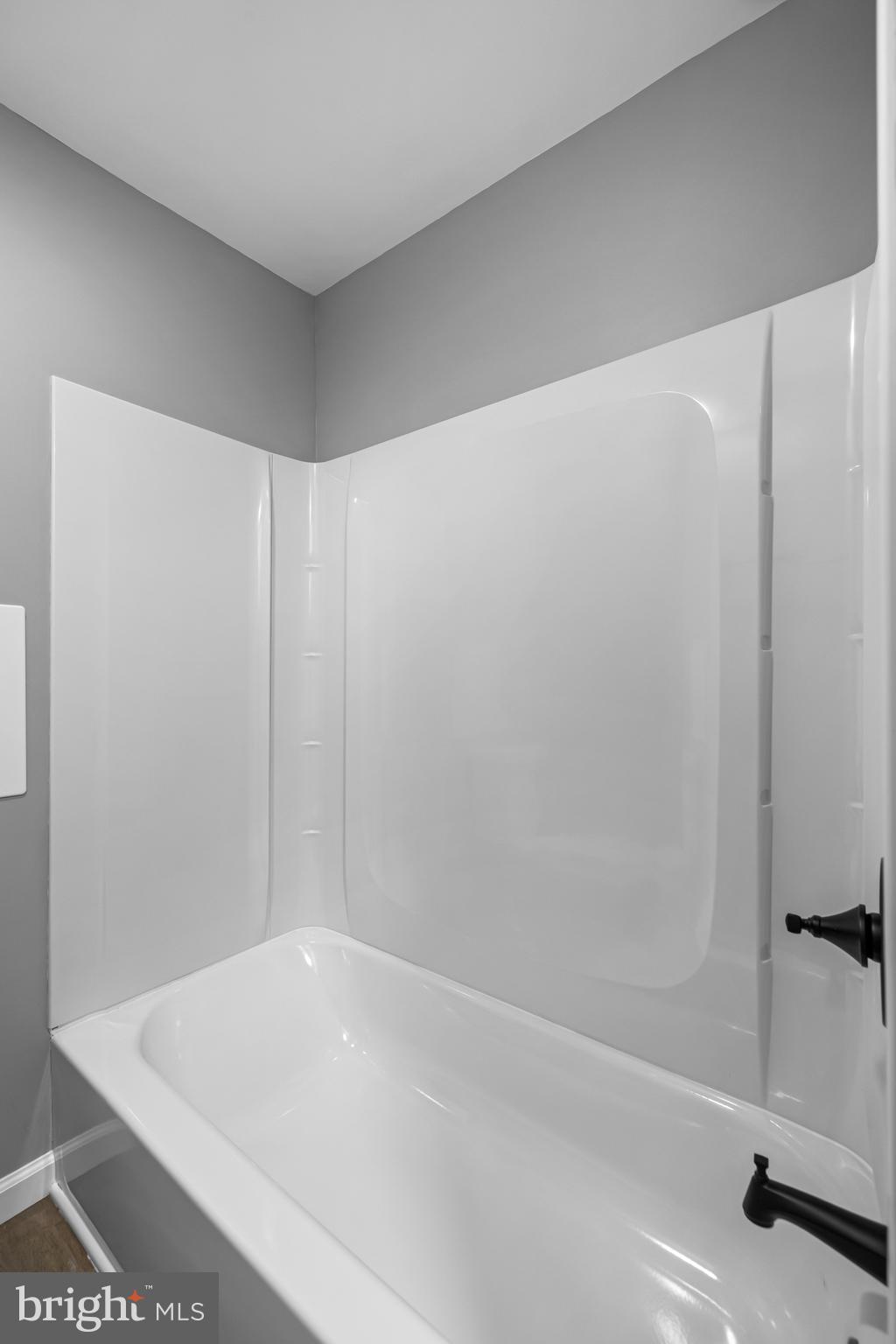 1480 Seven Valleys Road, Unit 3 York, PA 17408 - Photo 7 of 17 a bathroom with a bathtub