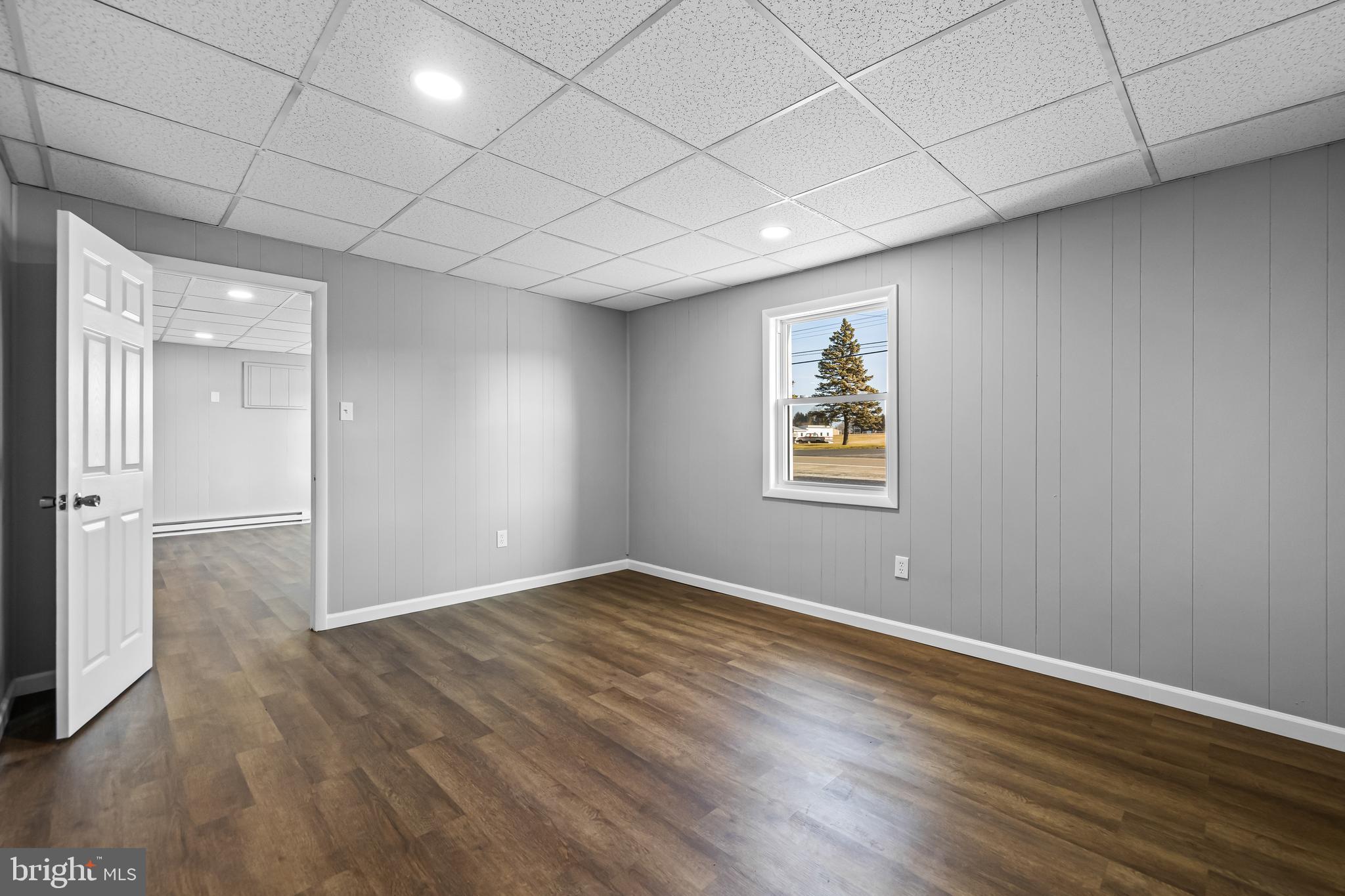 1480 Seven Valleys Road, Unit 3 York, PA 17408 - Photo 10 of 17 a view of empty room with wooden floor
