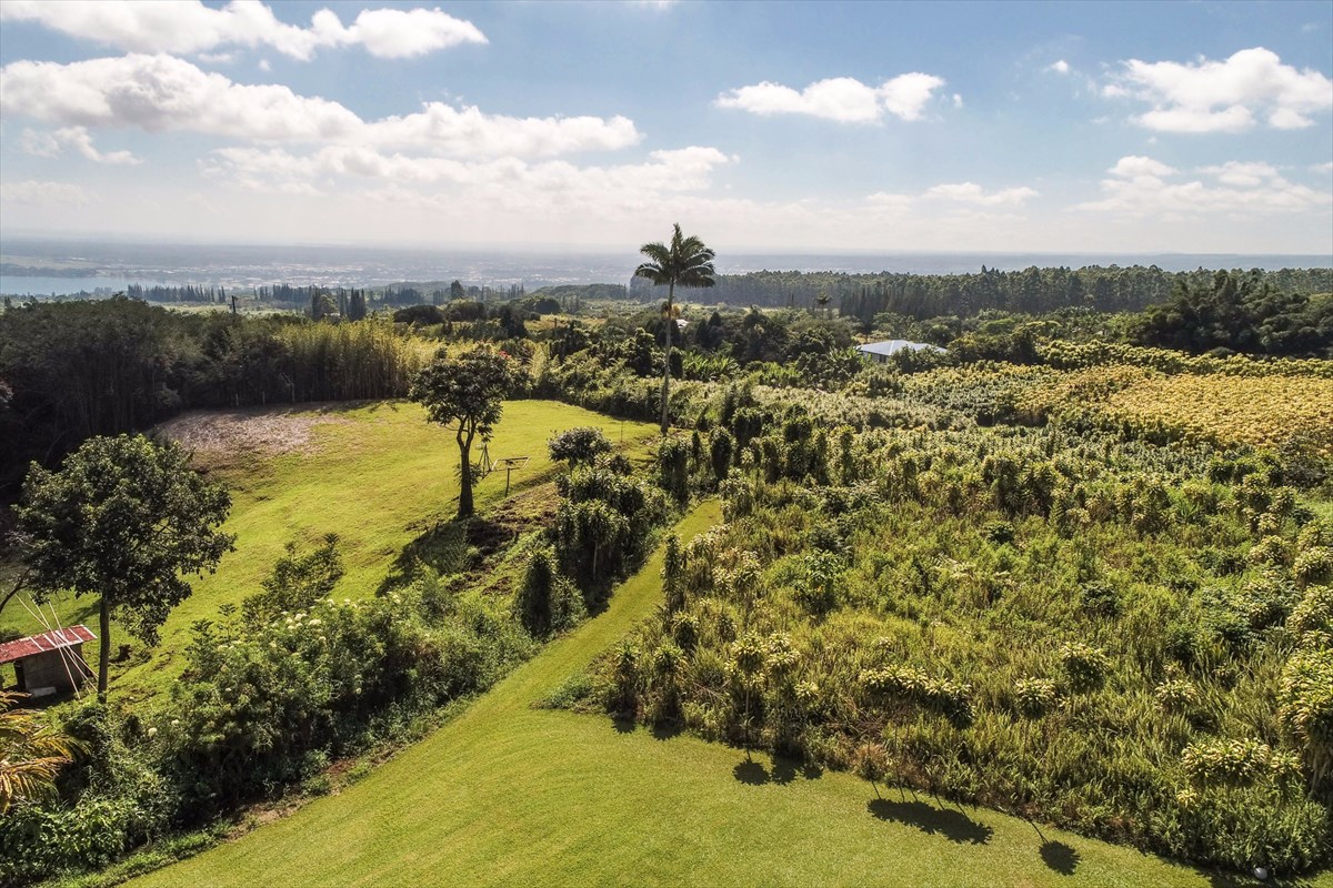 699 Kopa'a Road Hilo, HI 96720 - Photo 4 of 20 a view of a lake with a city