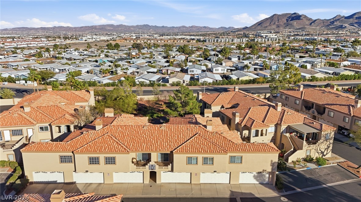 1851 Hillpointe Road, Unit 1311 Henderson, NV 89074 - Photo 42 of 47 Aerial perspective of suburban area with a mountain backdrop