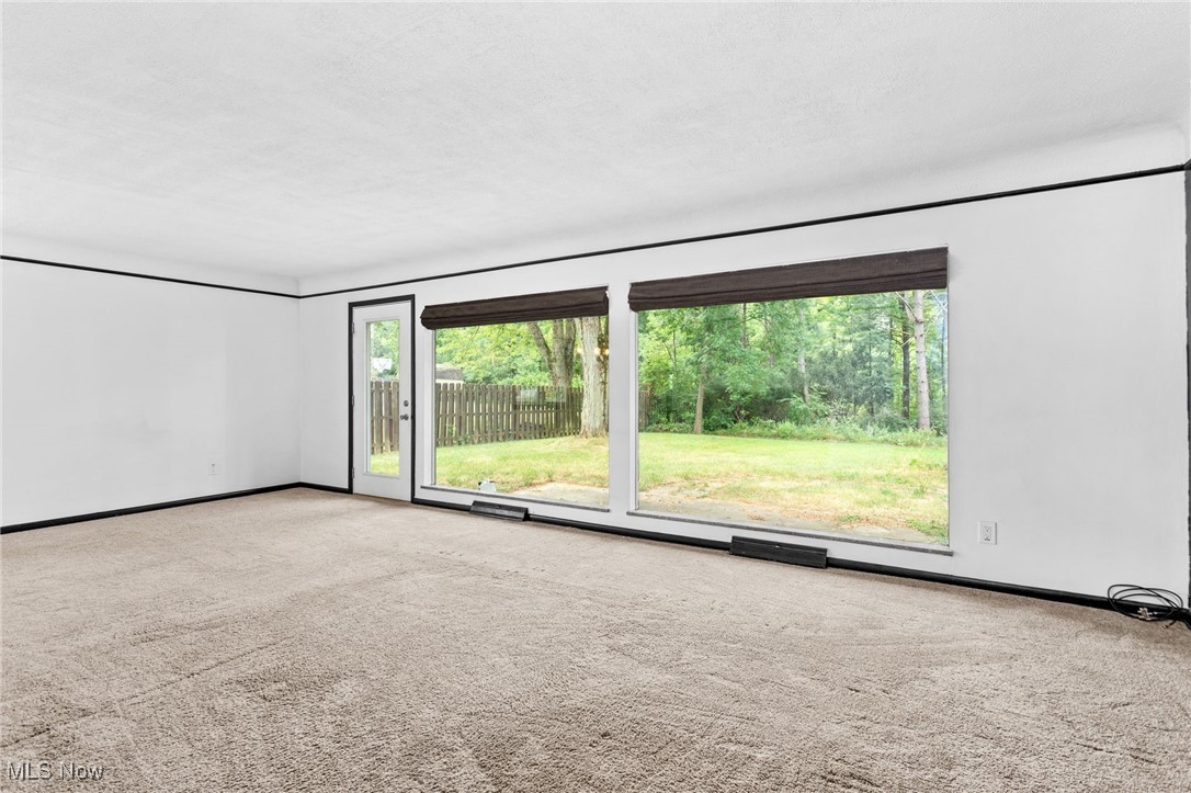 7654 Ragall Parkway Cleveland, OH 44130 - Photo 22 of 33 Carpeted spare room with baseboards