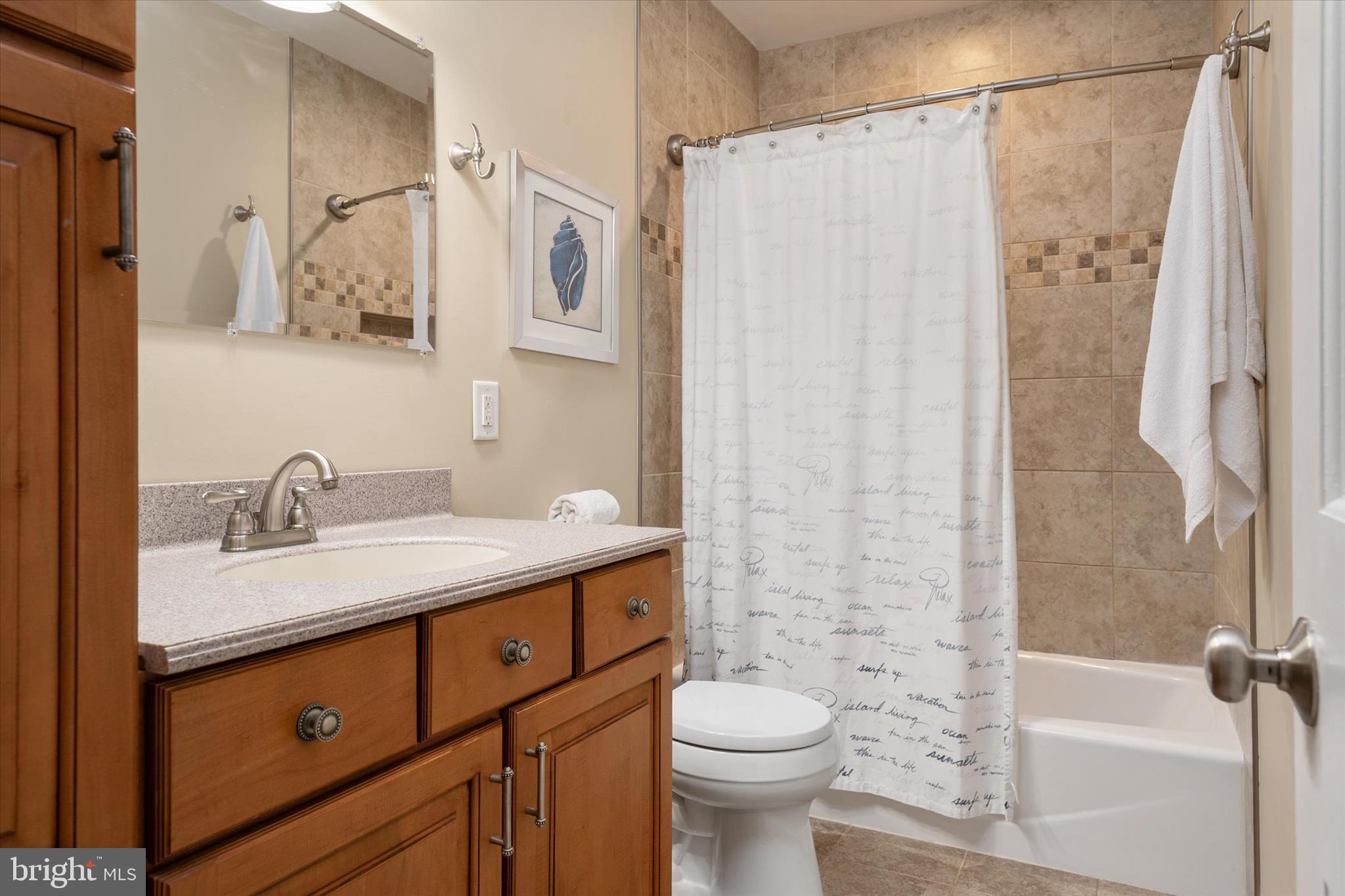 305 Charles Hall Road Millersville, MD 21108 - Photo 29 of 69 Upper level guest bathroom with ceramic tile