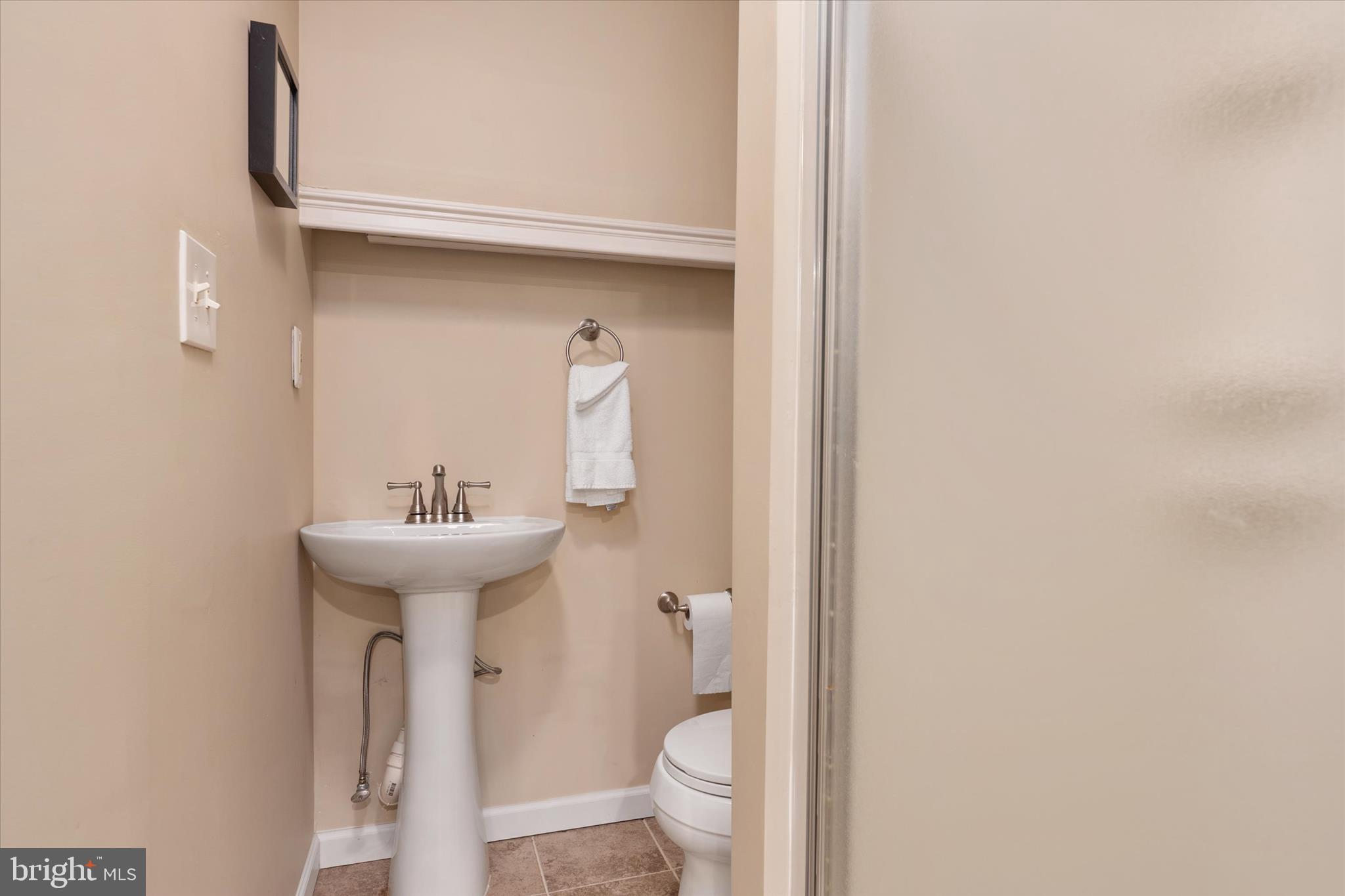 305 Charles Hall Road Millersville, MD 21108 - Photo 36 of 69 The lower level full bath with shower
