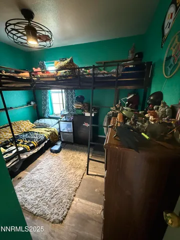 a room with furniture and a flat screen tv