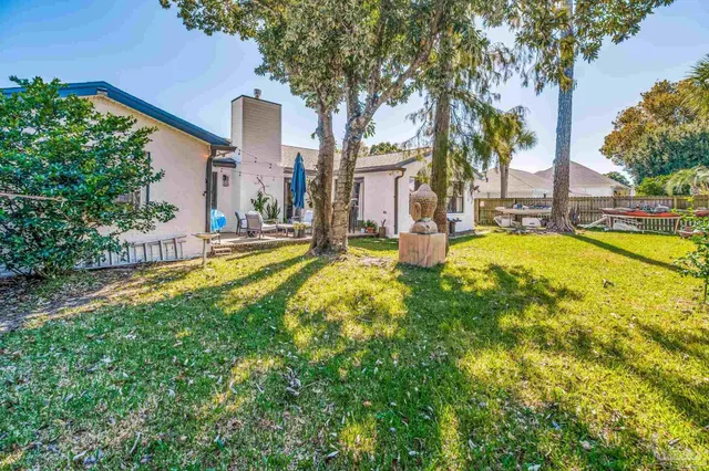 a view of a house with swimming pool