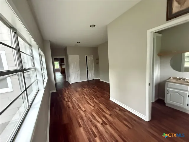 a view of swimming pool with a deck