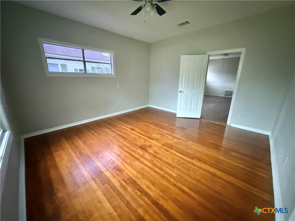 203 South 27th Street Temple, TX 76504 - Photo 3 of 15 a view of empty room with wooden floor