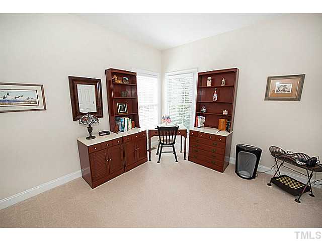 208 Okamato Street Raleigh, NC 27603 - Photo 11 of 25 First floor office with walk-in closet and half bath next to it.