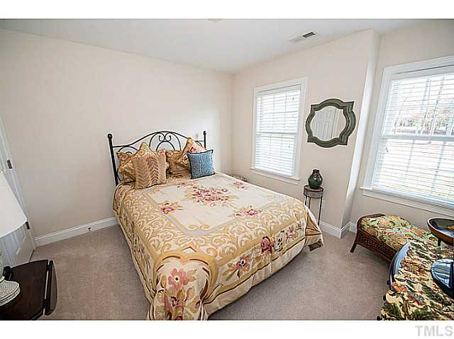 208 Okamato Street Raleigh, NC 27603 - Photo 16 of 25 Secondary bedroom with walk-in closet.