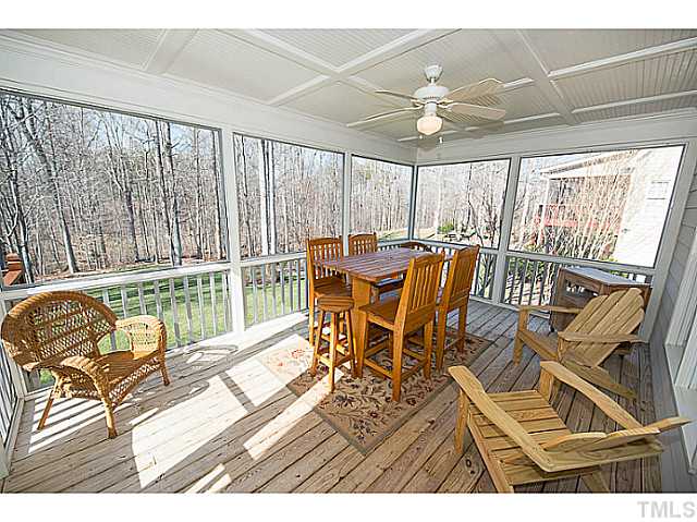 208 Okamato Street Raleigh, NC 27603 - Photo 19 of 25 Oversized screened porch has beadboard ceiling with fan and is prewired for surround sound.