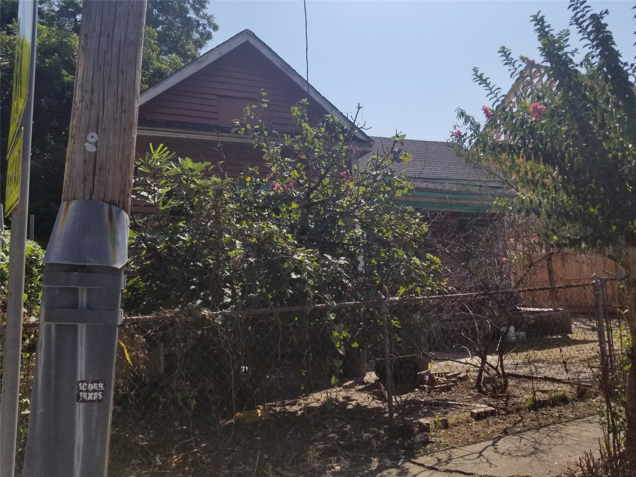2210 Hardy Street Houston, TX 77026 - Photo 3 of 4 a view of house with wooden fence