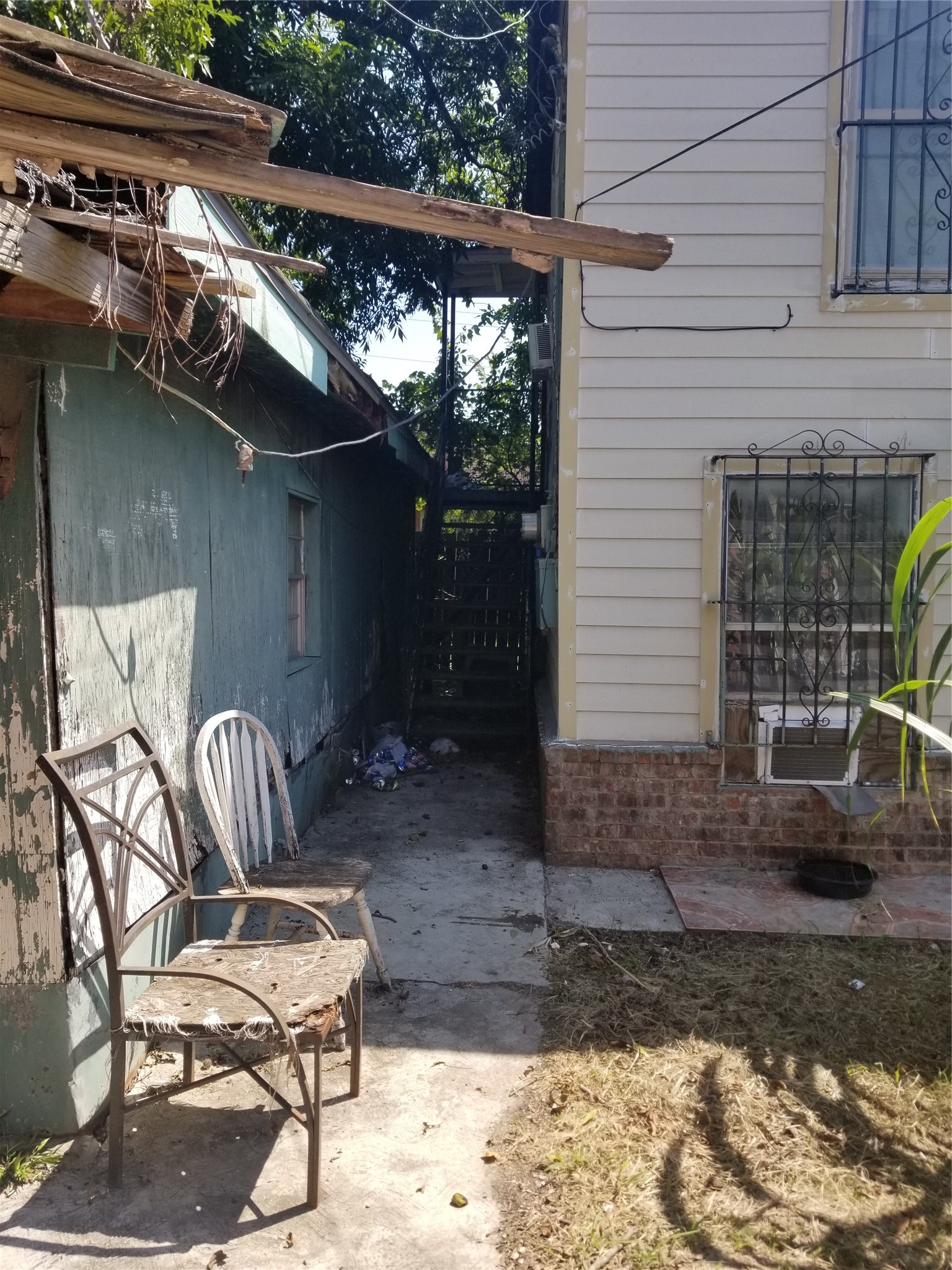 2210 Hardy Street Houston, TX 77026 - Photo 4 of 4 a view of backyard with outdoor seating and barbeque oven