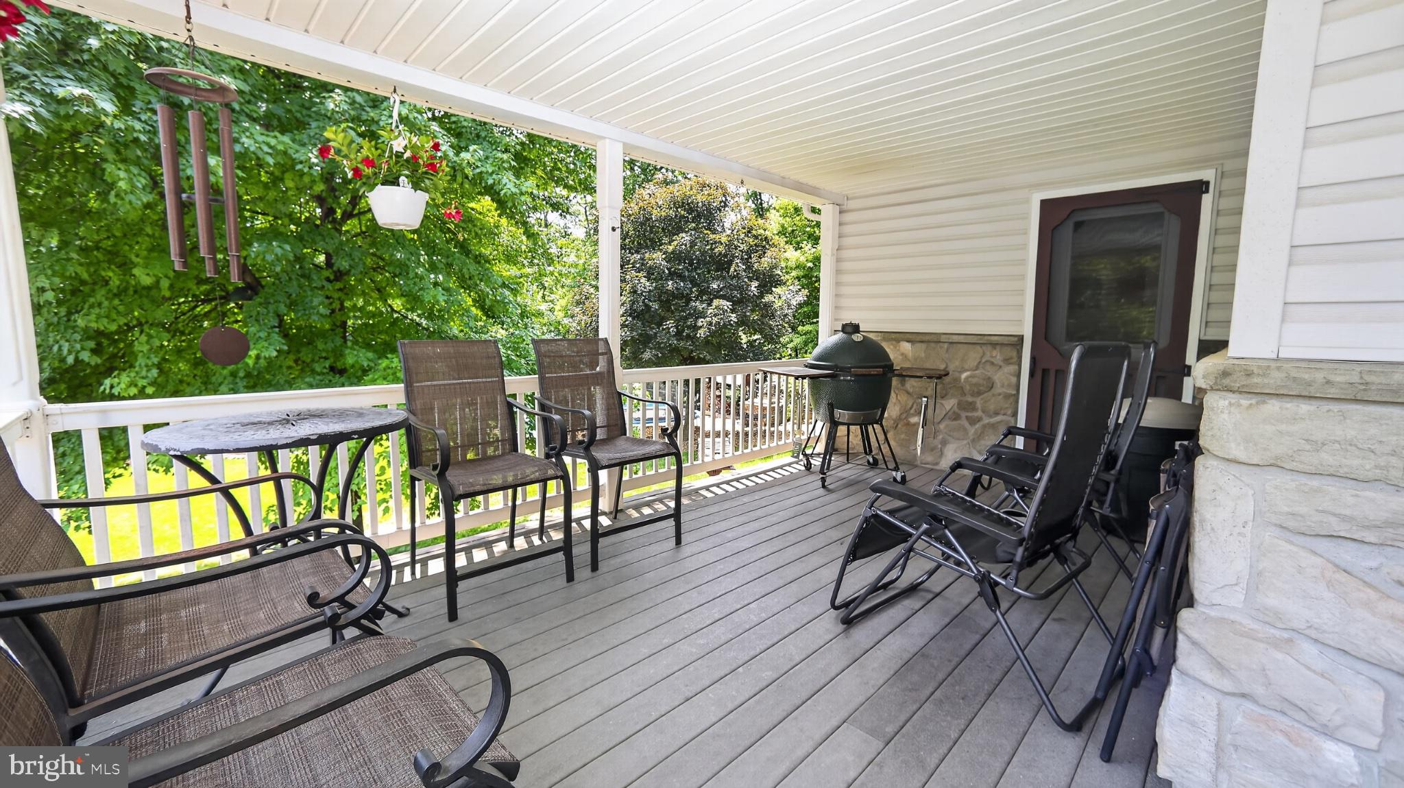 257 Hill Road New Holland, PA 17557 - Photo 83 of 94 Serene porch with lush green views.