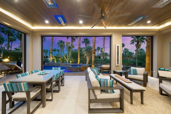 a outdoor living space with patio furniture and a potted plant