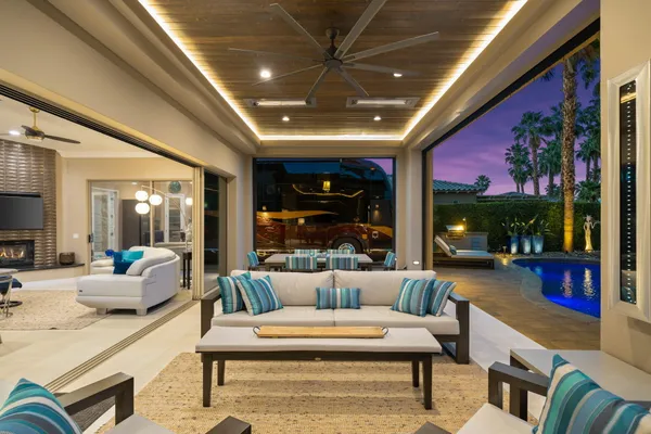 a view of a patio with swimming pool