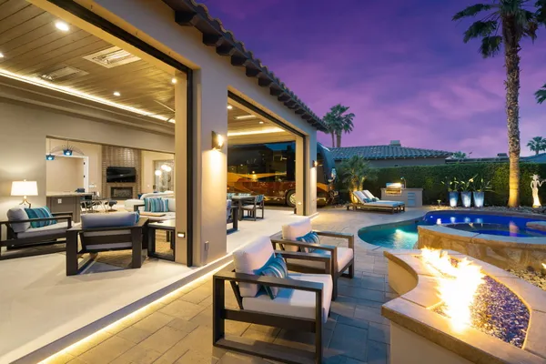 a view of outdoor seating space and fire pit