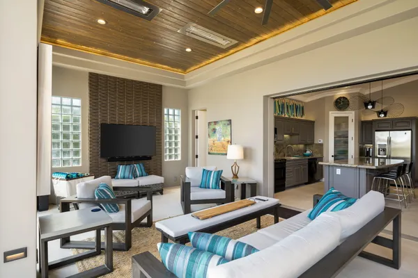 a bathroom with a granite countertop sink a toilet and a shower
