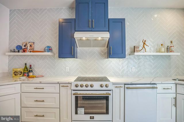 a view of cabinets with wooden floor