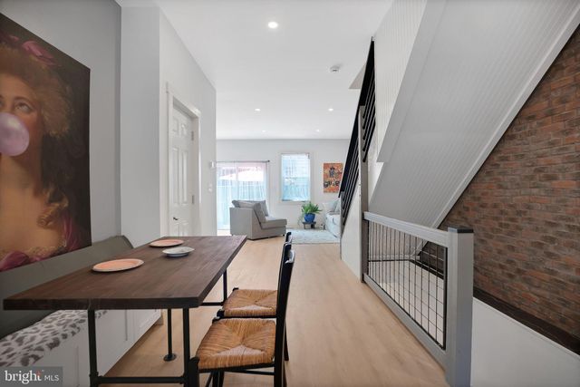 a bathroom with a toilet and a sink