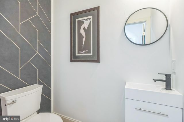 a view of kitchen with wooden floor