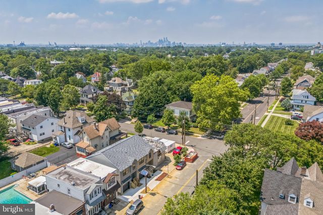 a view of a house with roof deck