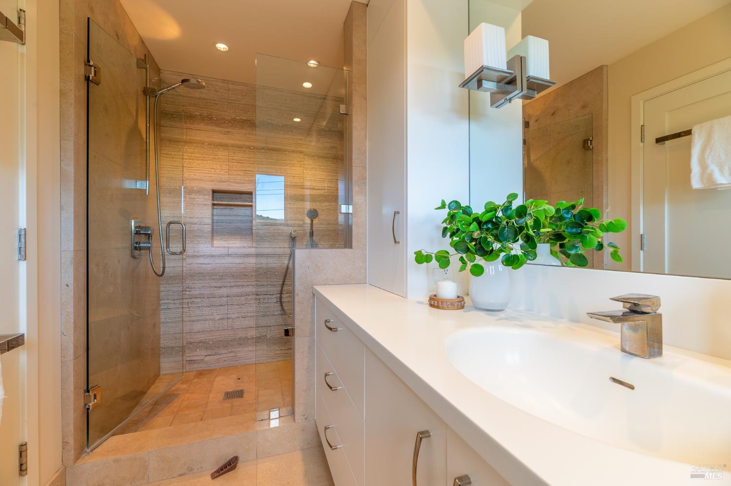 4 Galway Lane San Rafael, CA 94903 - Photo 18 of 45 a bathroom with a shower sink and mirror